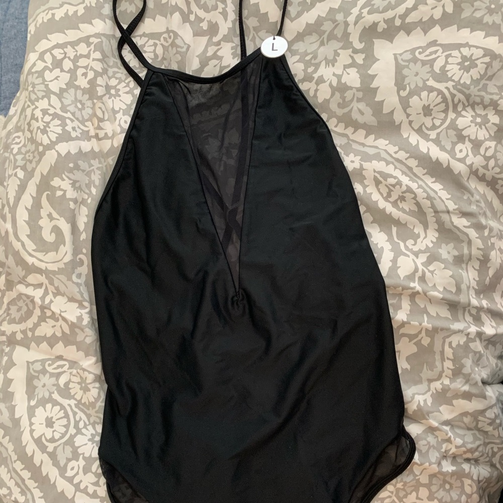 Black one piece swim suit forever 21 tag attached